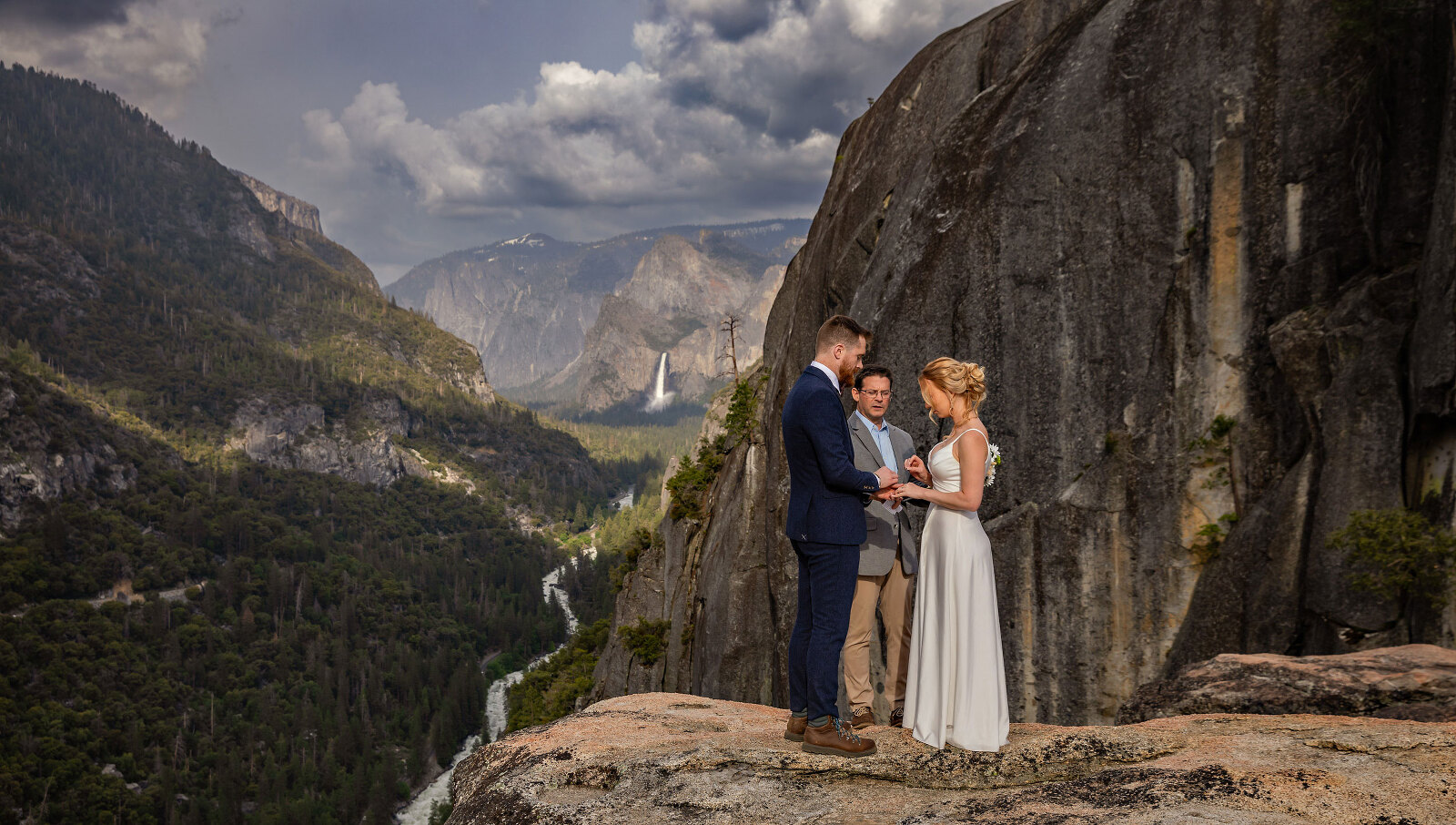 adventure wedding on rock point with waterfall