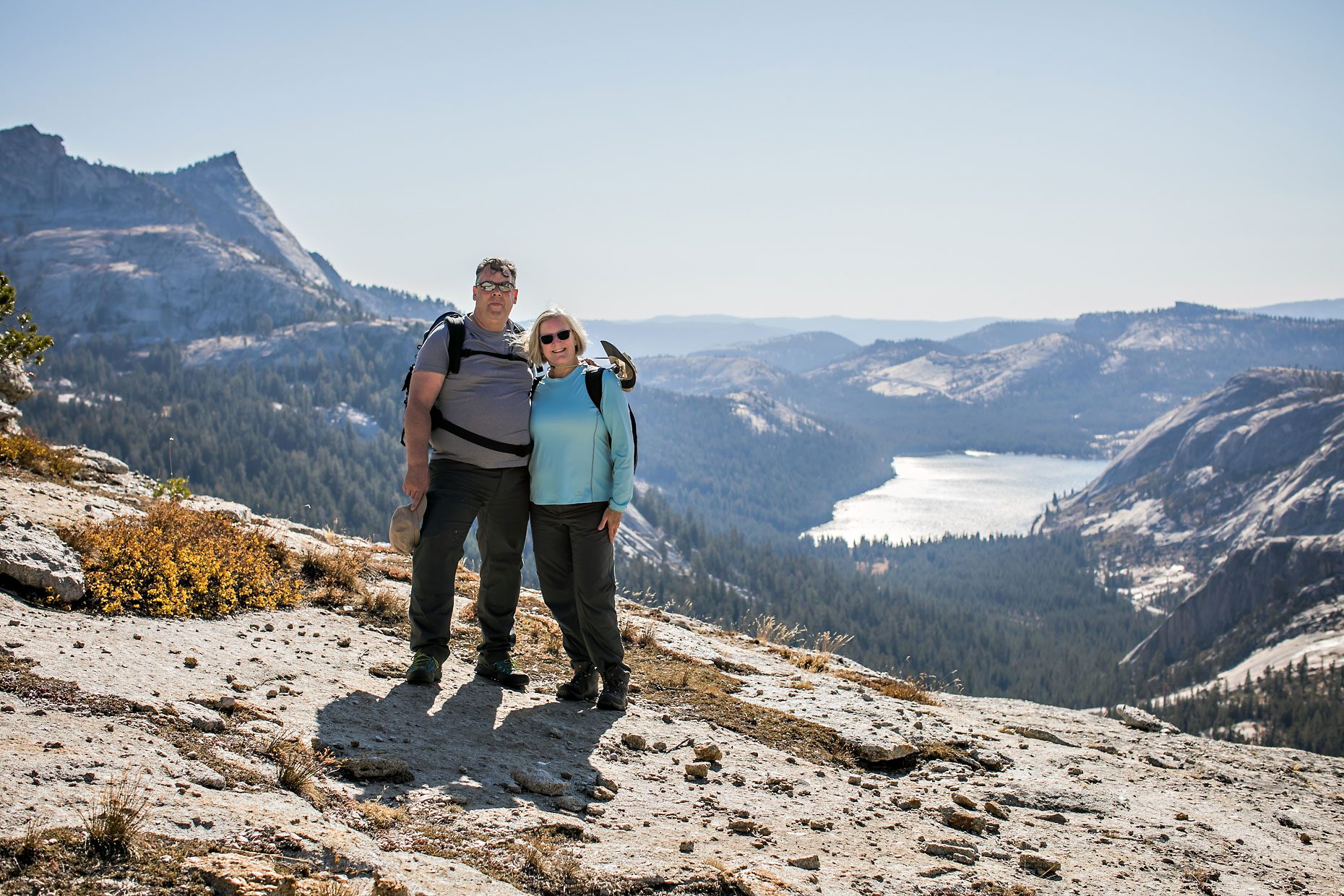Image of couple in love getting adventure session photography in Yosemite’s high country out of Tuolumne Meadows.