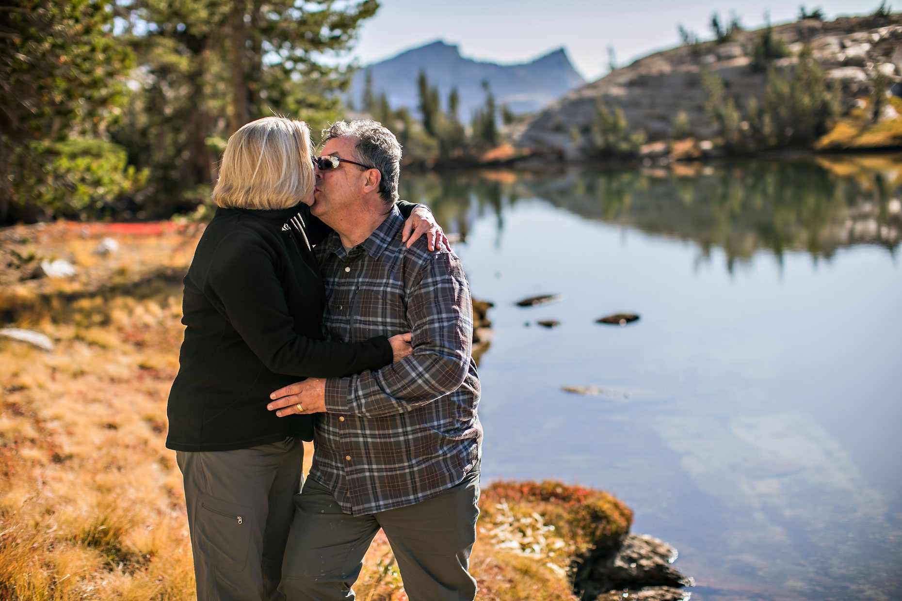 Image of couple in love getting adventure session photography in Yosemite’s high country out of Tuolumne Meadows.