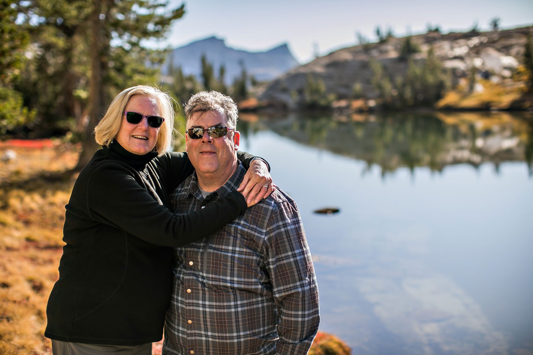 Image of couple in love getting adventure session photography in Yosemite’s high country out of Tuolumne Meadows.