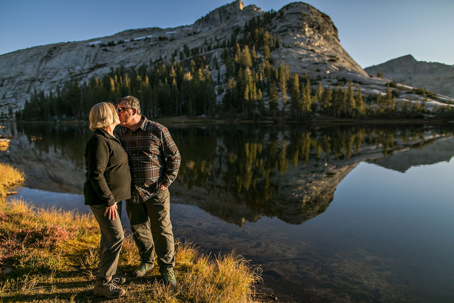 Image of couple in love getting adventure session photography in Yosemite’s high country out of Tuolumne Meadows.