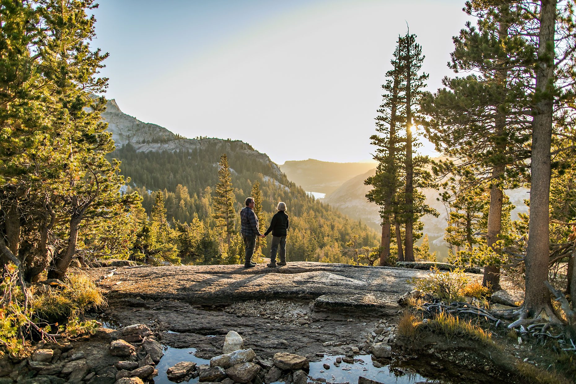 Image of couple in love getting adventure session photography in Yosemite’s high country out of Tuolumne Meadows.