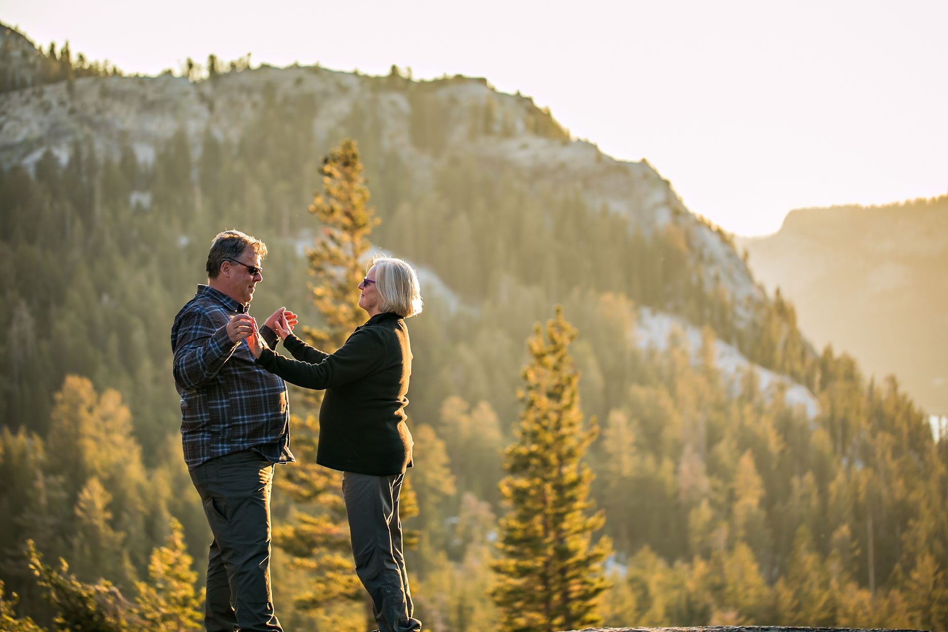 Image of couple in love getting adventure session photography in Yosemite’s high country out of Tuolumne Meadows.
